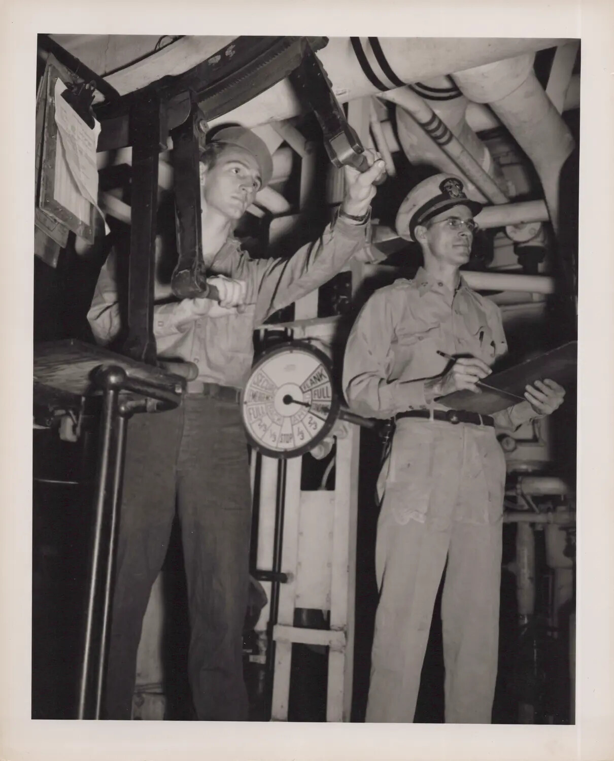 U.S. Navy Engineering Personnel Operating Engine Order Telegraph Aboard Escort Carrier, World War II