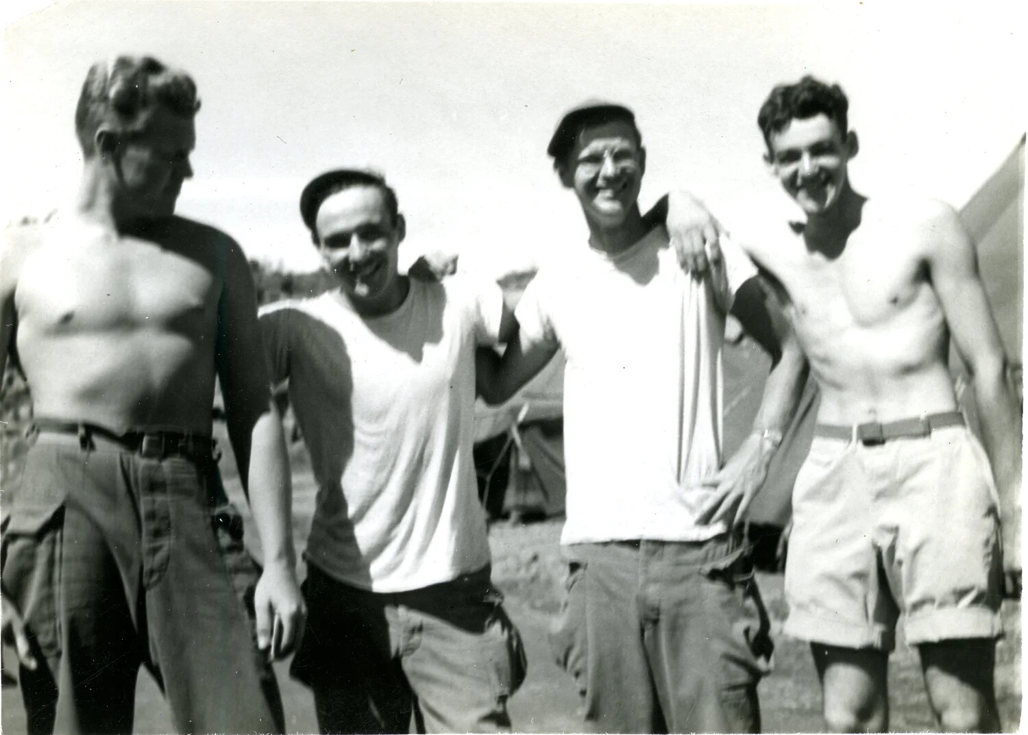 Informal Group Portrait of Four U.S. Marines at a Bivouac Camp, 5th Marine Division, World War II