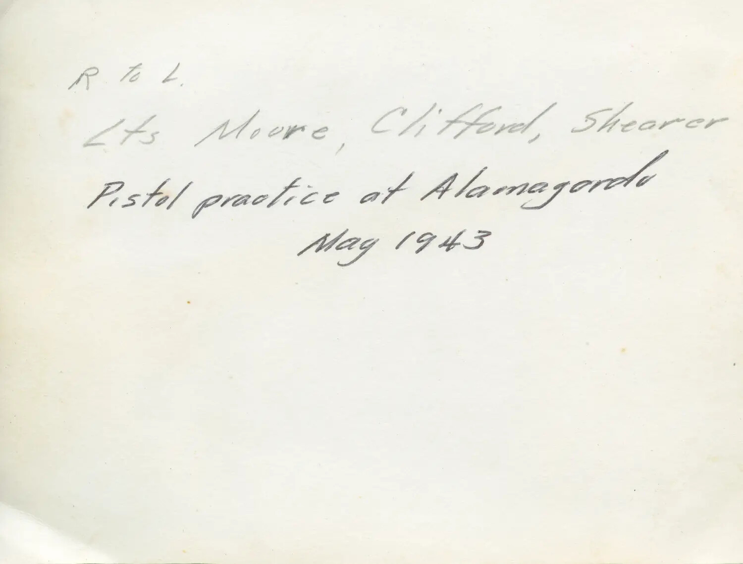 Verso Caption Card: "Lts Moore, Clifford, Shearer - Pistol Practice at Alamogordo, May 1943"