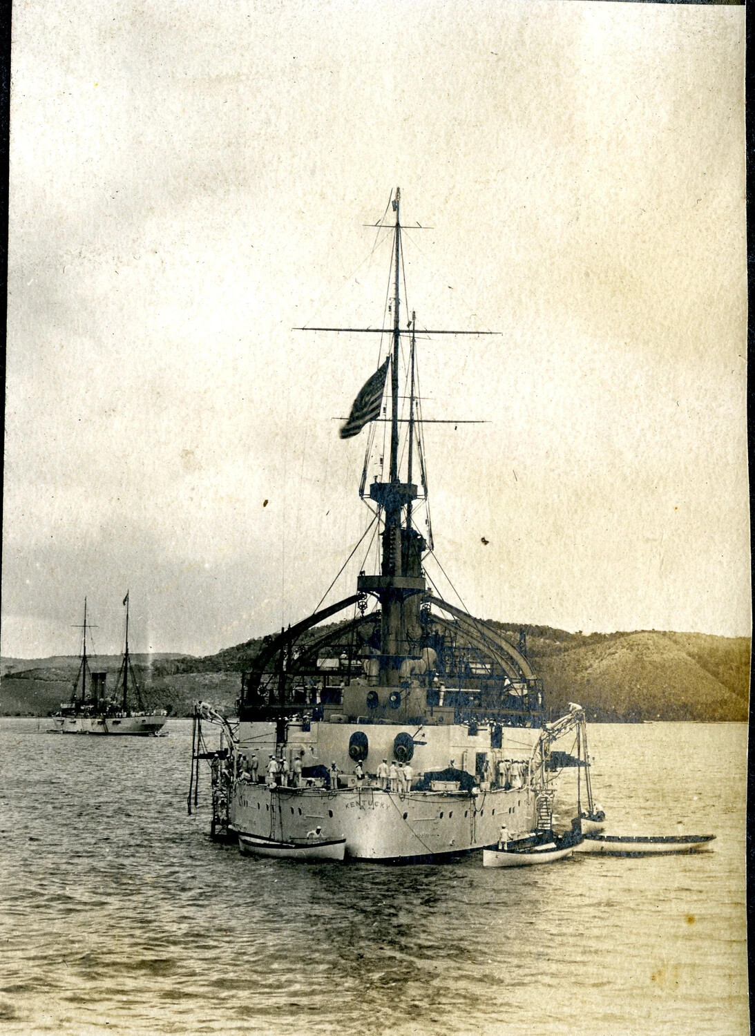 USS Kentucky (BB-6) at Anchor, Stern View, in a Caribbean or Central American Harbor