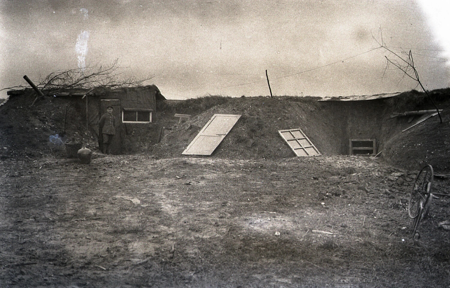 Row of Earth-Covered Dugouts with Salvaged Doors and Windows, World War I