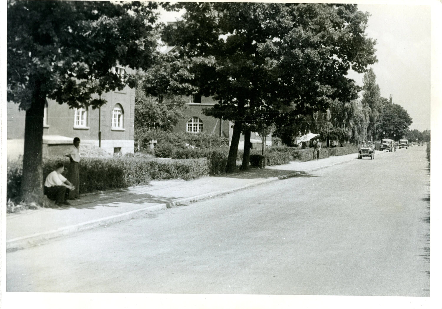 U.S. Soldiers and Jeeps on a European Street, 11th Armored Division, WWII Occupation Period