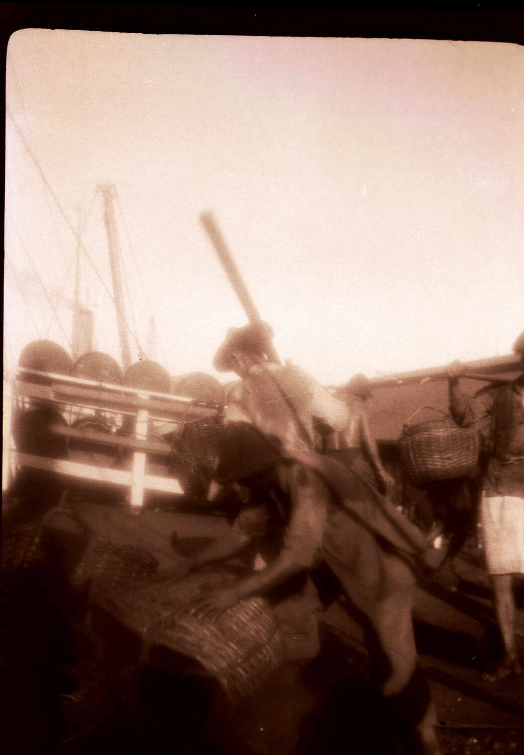 Dockworkers Loading Baskets Aboard a Chinese Junk, Pre-WWII China