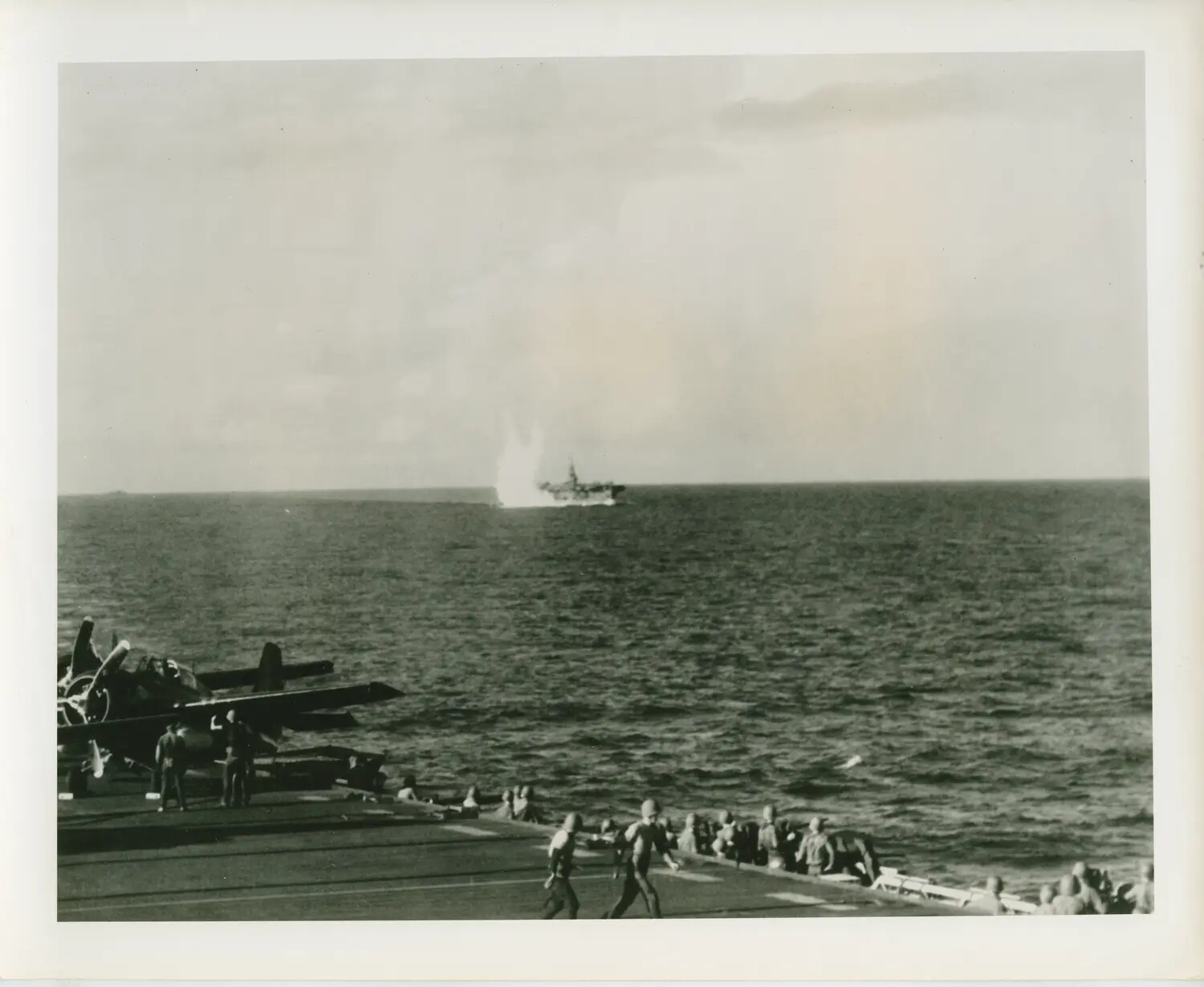 Flight Deck View of Distant Ship Under Attack, USS Petrof Bay (CVE-80) Collection, WWII Pacific
