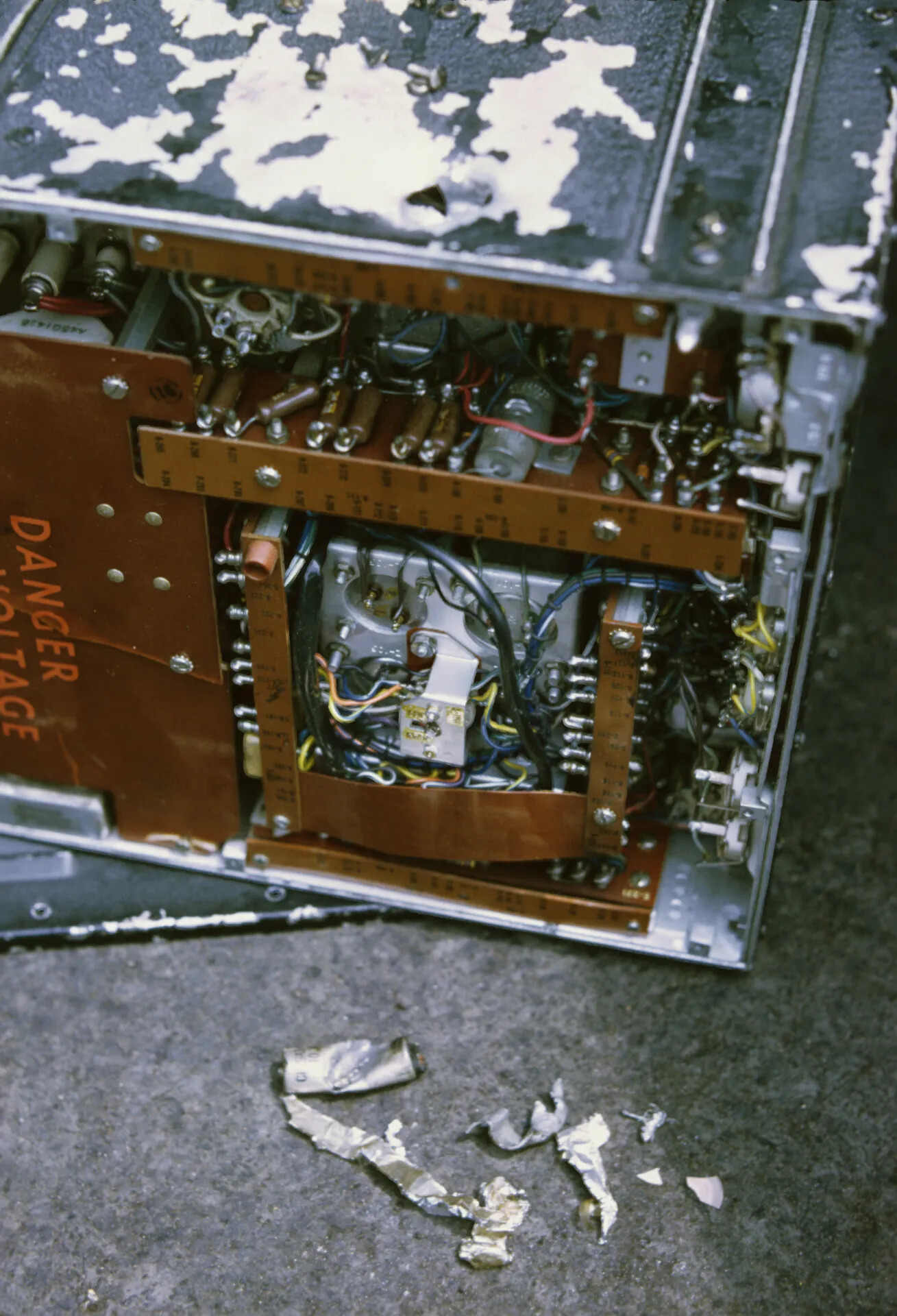 Damaged Aircraft Avionics Chassis with Peeled Paint and High-Voltage Warning Label, Don Engebretsen Collection