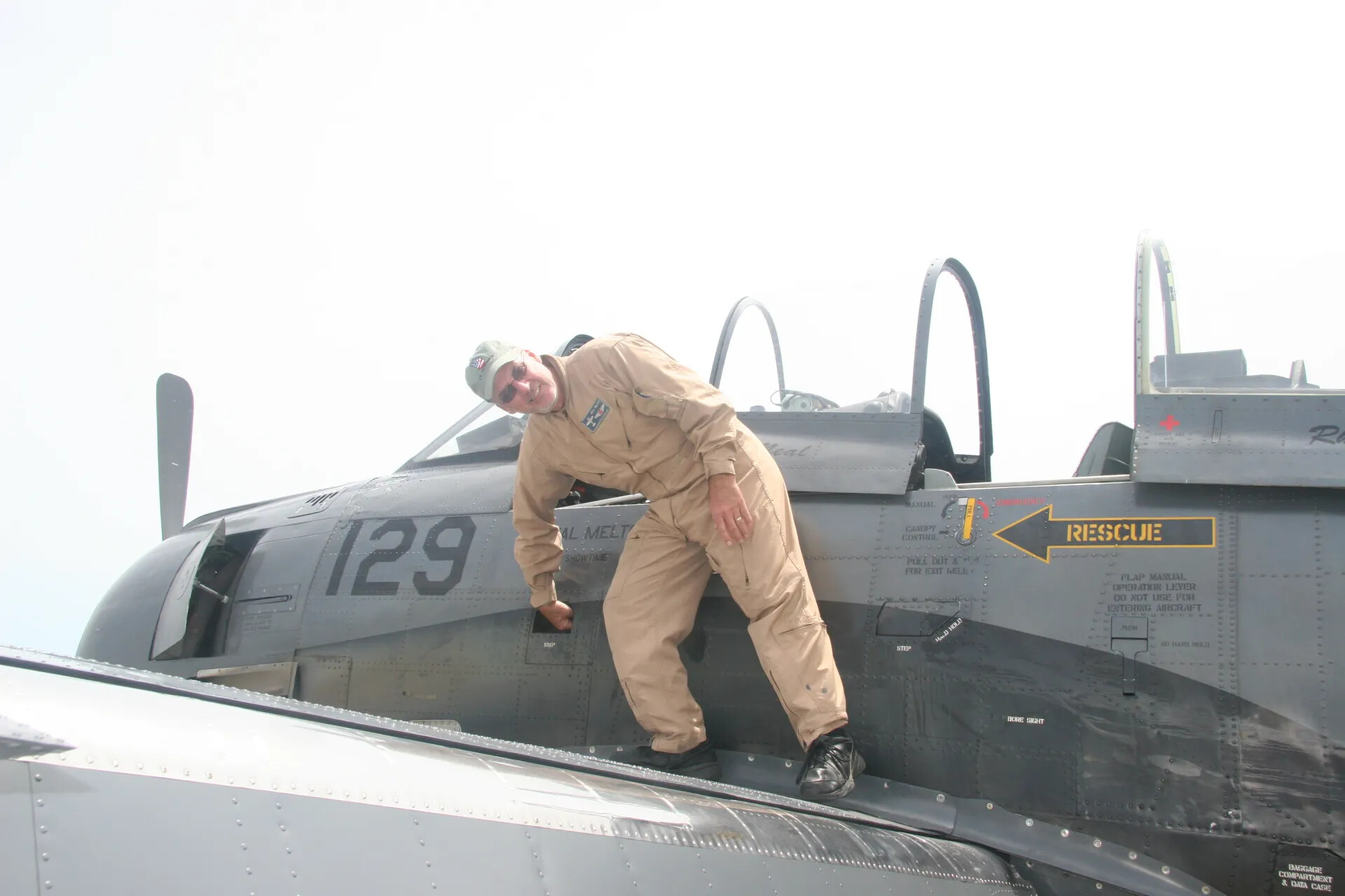 Pilot Disembarking a Two-Seat A-1 Skyraider Warbird '129,' Operation Tailwind Reunion, 2016