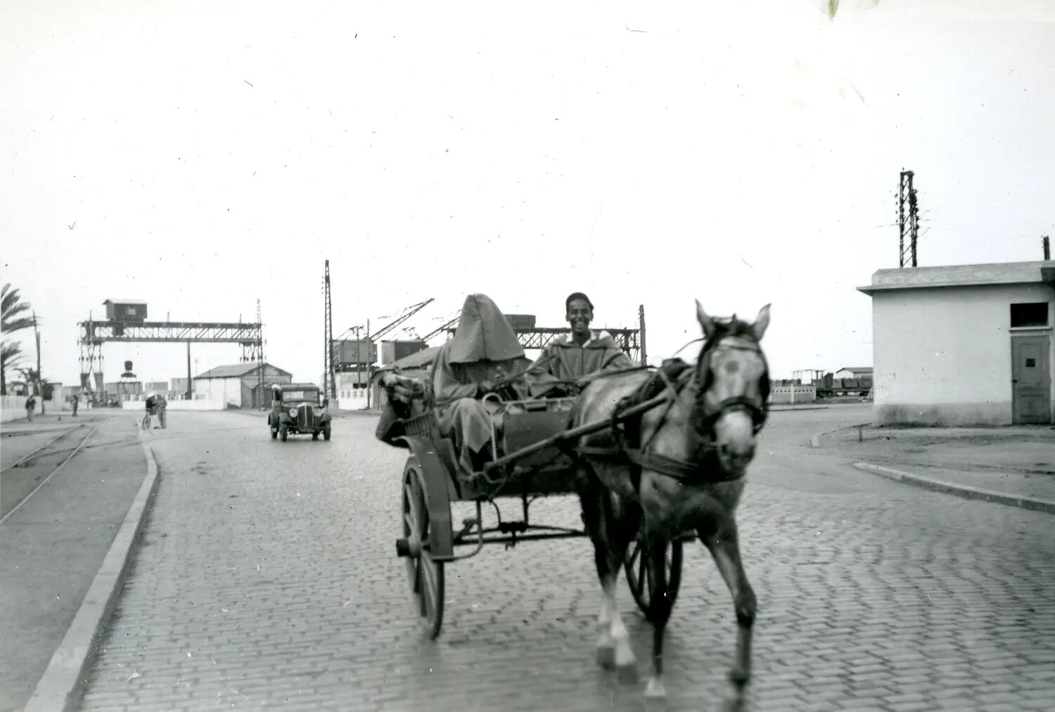 Horse-Drawn Cart on Cobblestone Port Street, WWII-Era Transit Stop, China-Burma-India Theater Archive