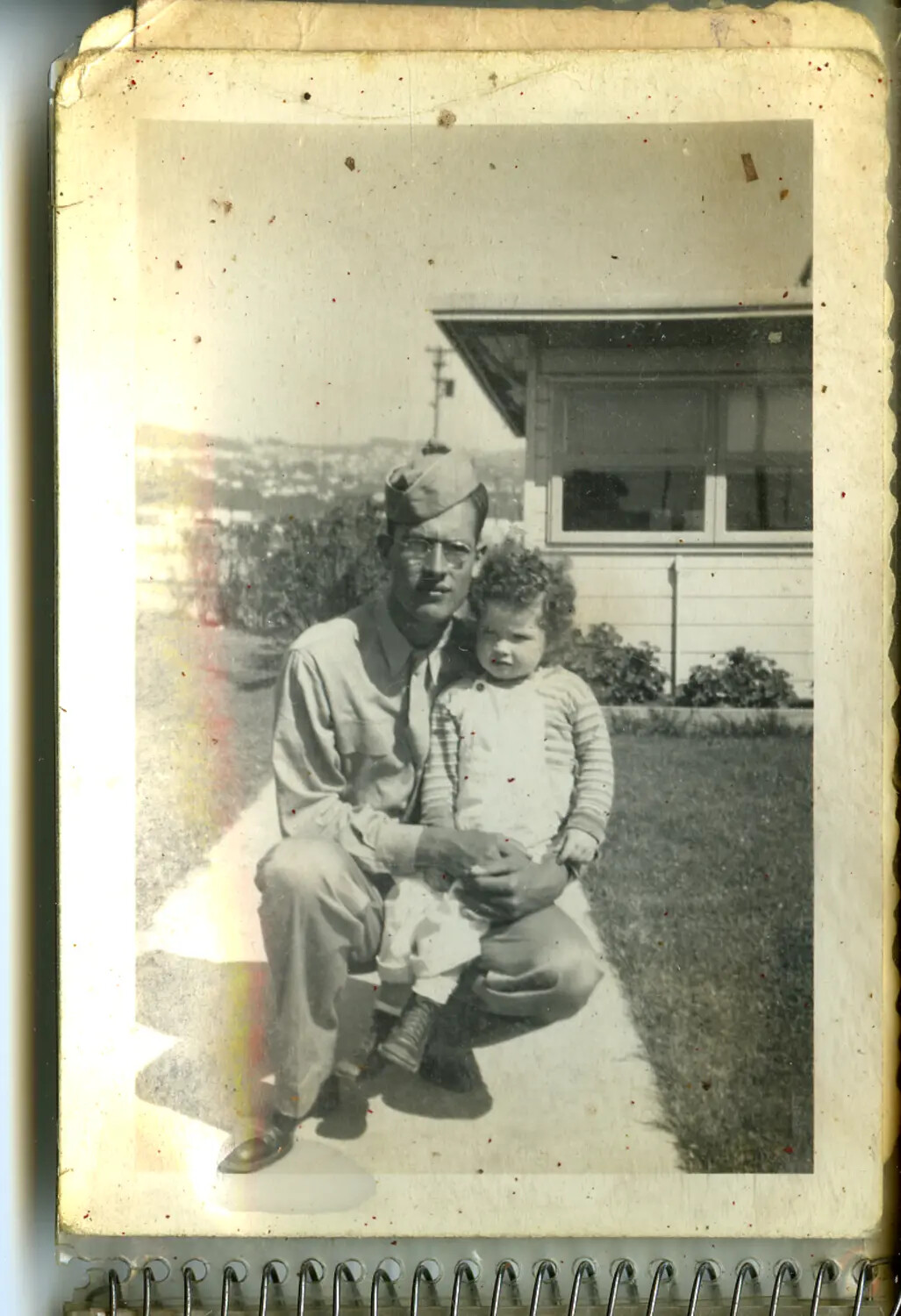 Soldier and Young Child, Home-Front Snapshot (Photo Album Page)