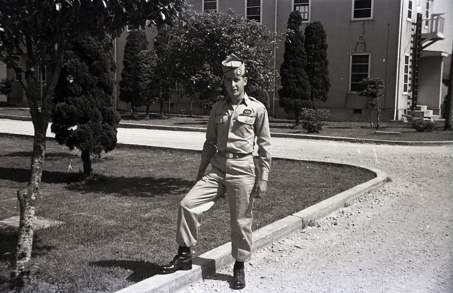 187th Airborne RCT Soldier Posing at Barracks Courtyard, Korean War Era