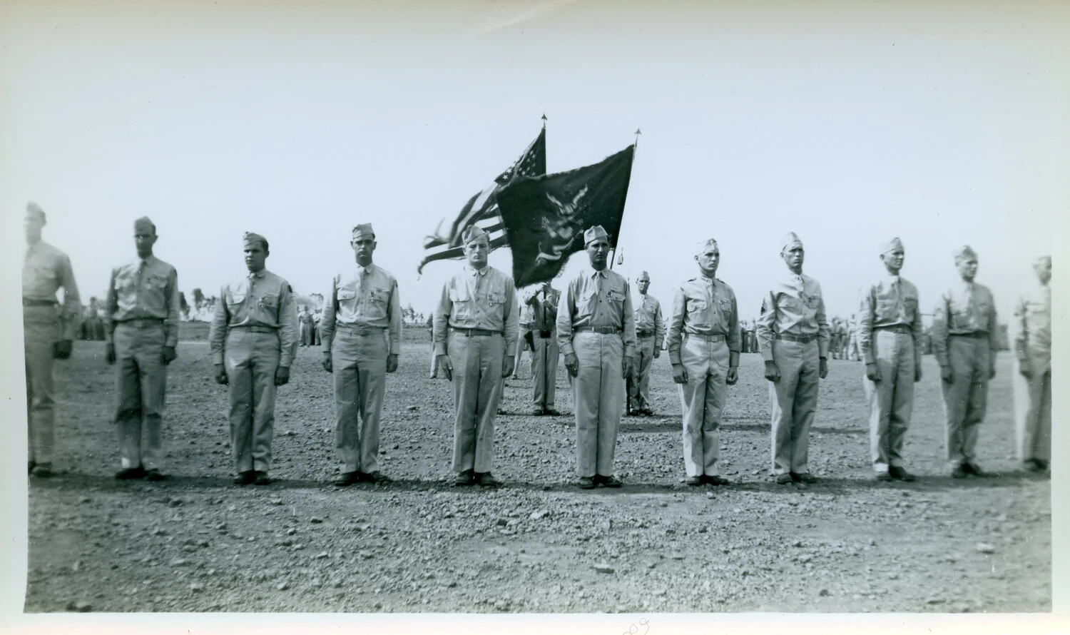 Formation of Servicemen with Color Guard on Field Base, WWII Era
