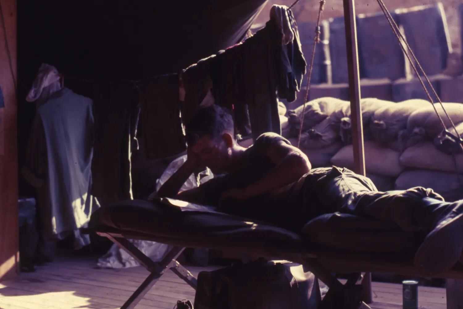 Serviceman Resting on Cot in Tent, Cam Ranh Bay, Vietnam War Era