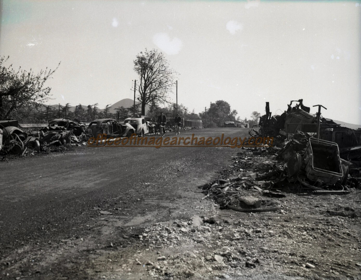 Road Littered with Burned-Out Vehicle Wrecks After Allied Air Attack, Germany, World War II