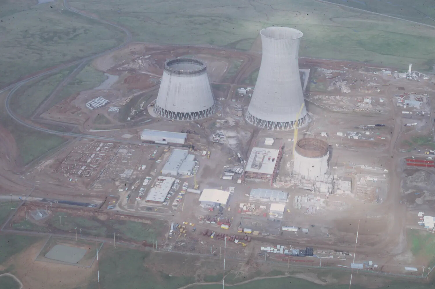 Aerial View of Power Plant Construction Site with Cooling Towers (Modern, Non-Historical Image - Mislabeled)