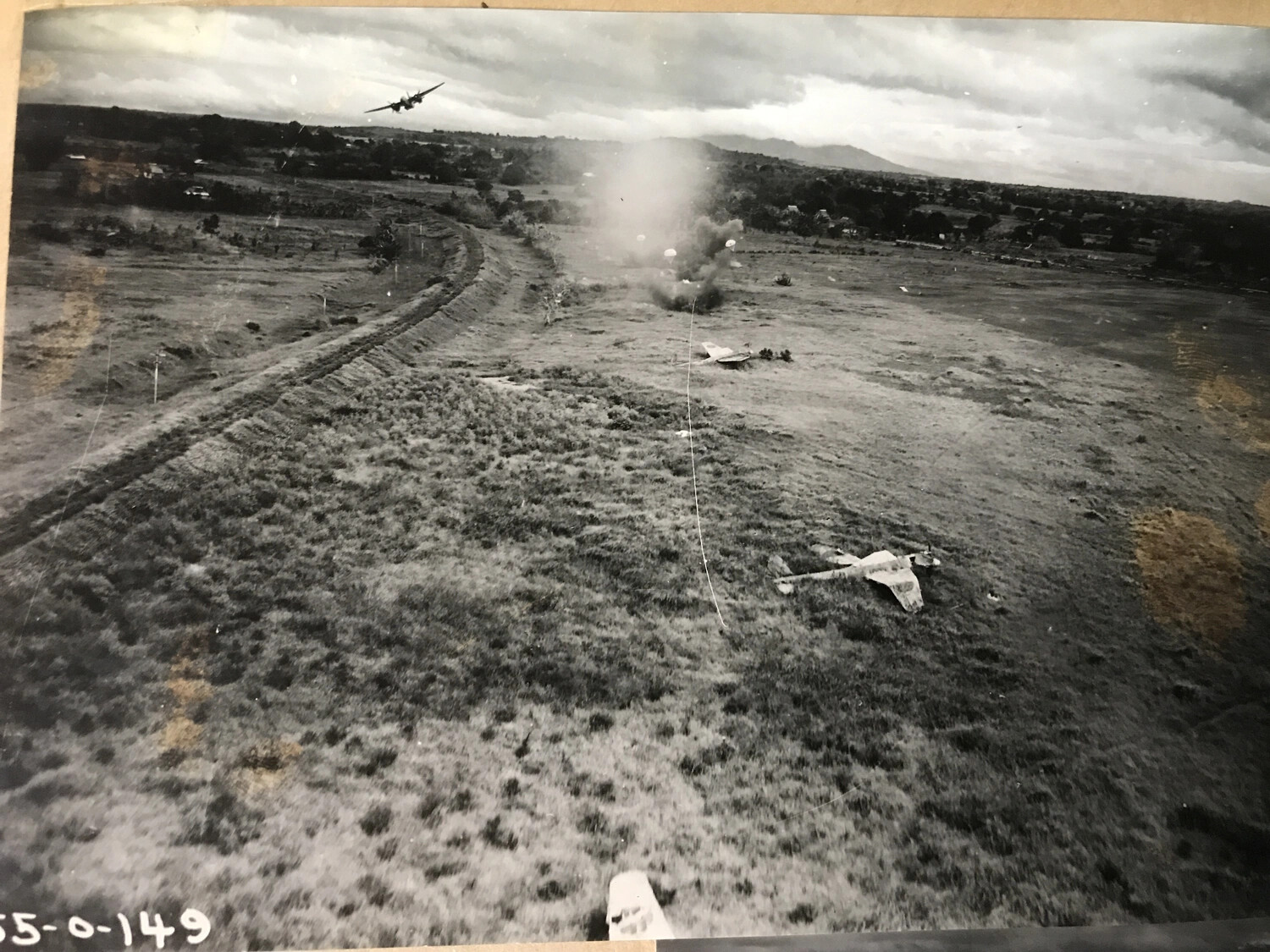 Low-Level Strafing and Parafrag Attack on Japanese Airfield, with Photo Reference Number '55-0-149'