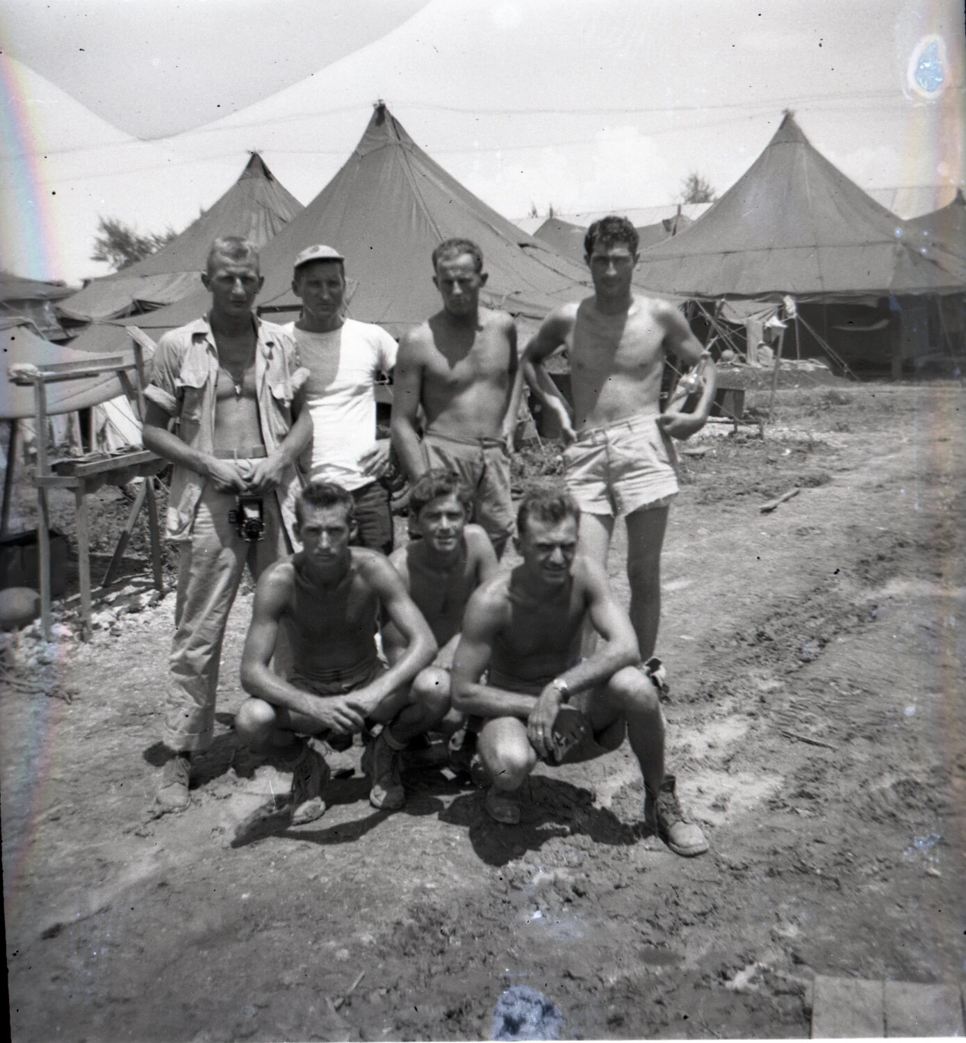 Informal Group Portrait of American Servicemen at Tent Camp, Ie Shima / 345th Bomber Group Collection