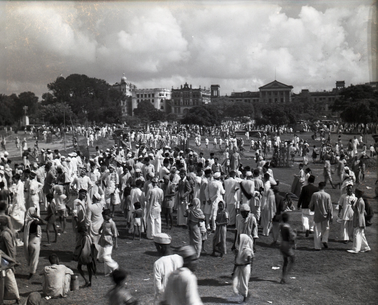 Crowd on the Calcutta Maidan, Colonial-Era Buildings in Background — CBI Theater Personal Photograph, WWII