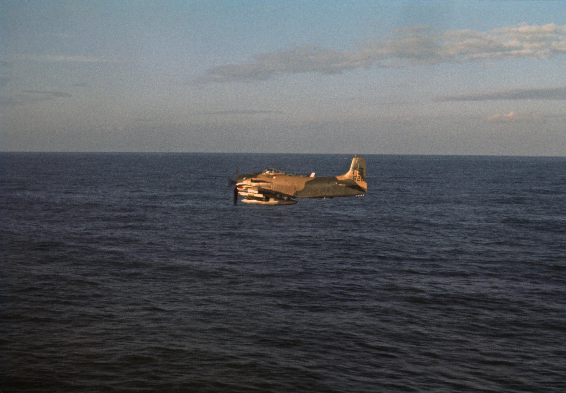 A-1 Skyraider Seen From a Wingman's Cockpit Over the Sea