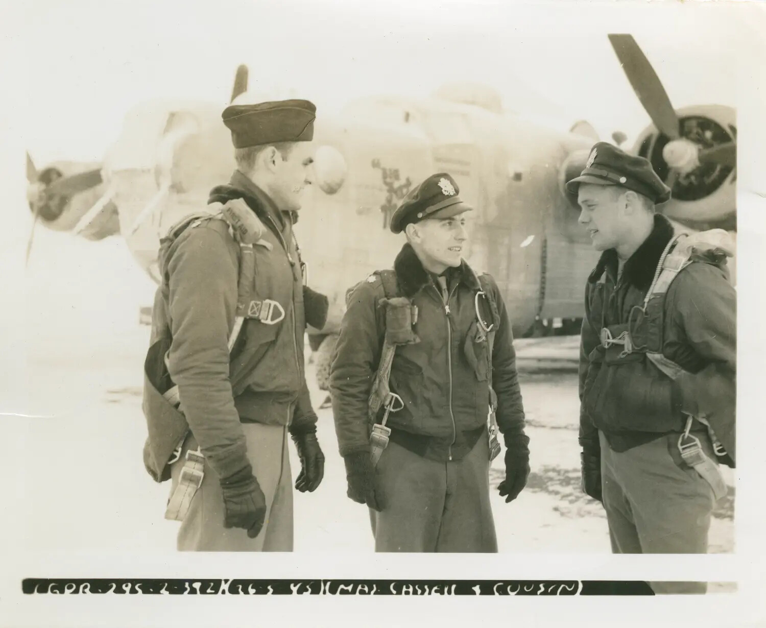 Maj. Harrison Cassell, Maj. Myron Keilman, and Cassell's Cousin Before B-24 Liberator, 392nd Bomb Group, Wendling, England, March 1945