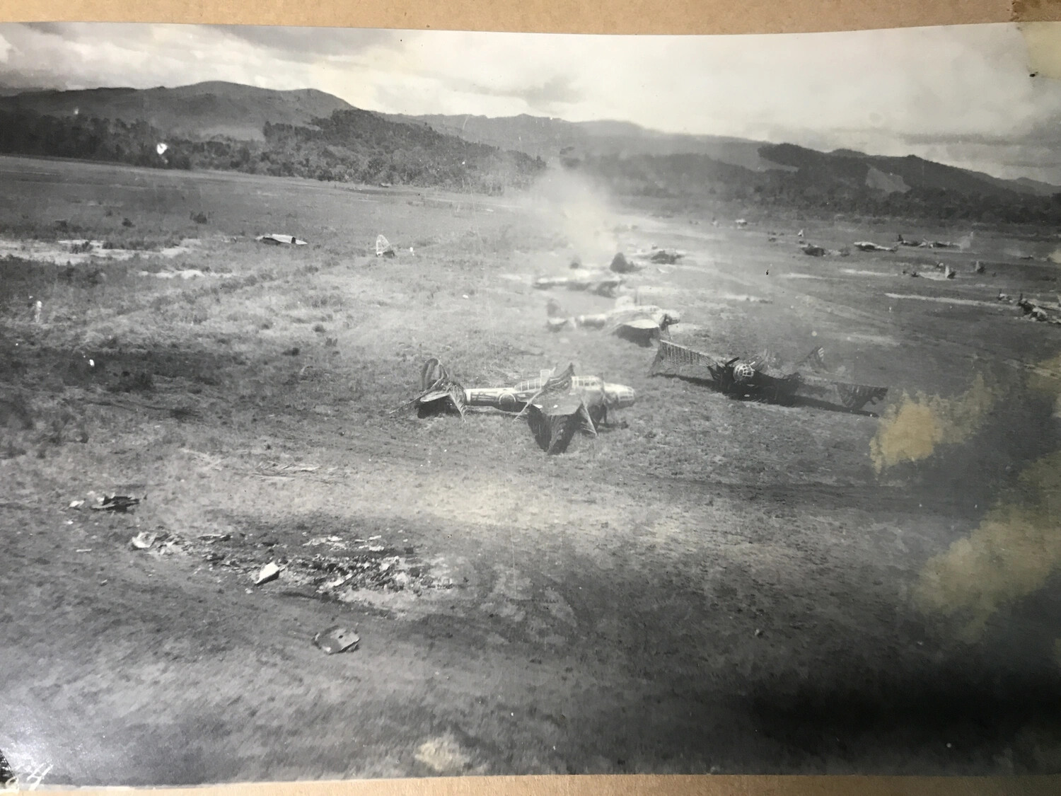 Destroyed Japanese Aircraft Littering Airfield After Strafing Attack (Duplicate Print)
