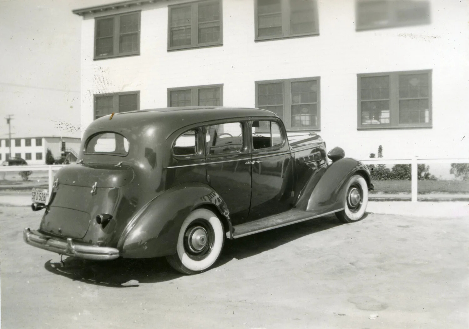 1930s Sedan Automobile Parked at Marine Corps Air Station, VMF-214 Collection, 1945
