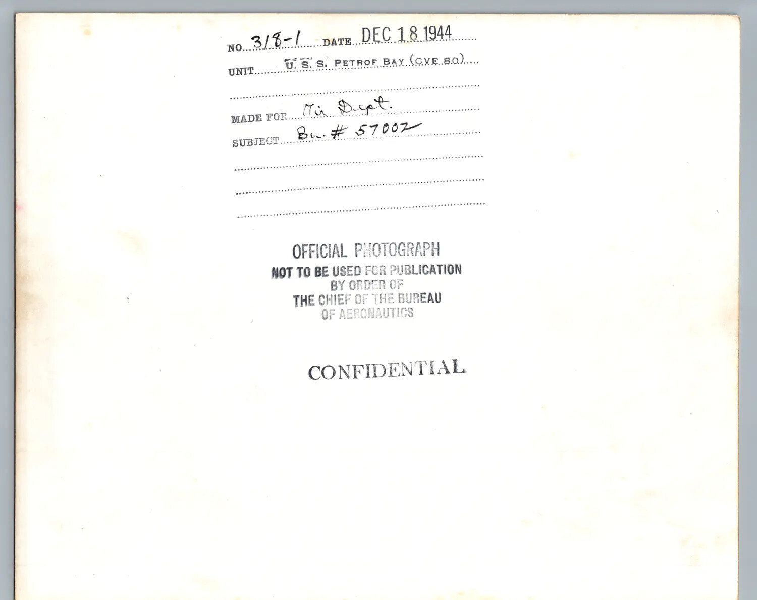Caption Card, U.S.S. Petrof Bay (CVE-80), 18 December 1944 - Aircraft Bu. No. 57002