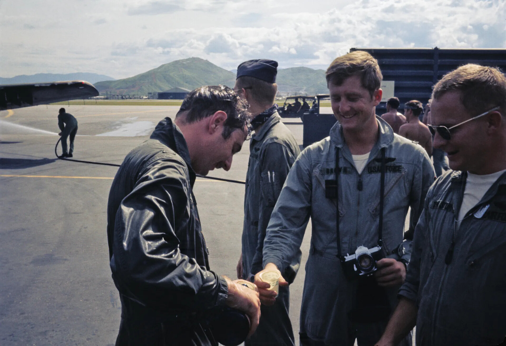 Airmen Celebrate Mission Milestone on Flight Line, Southeast Asia