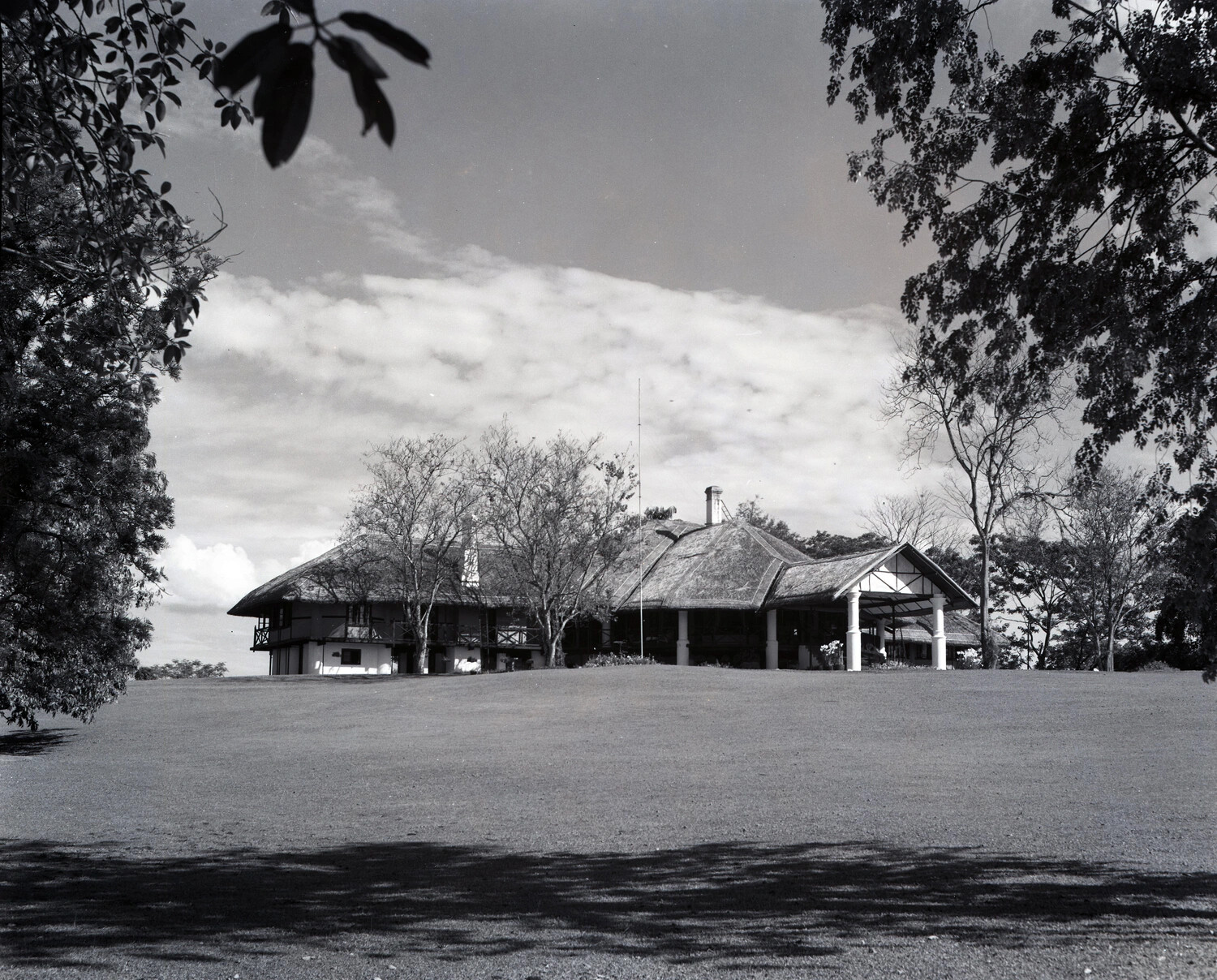 Colonial-Style Bungalow with Thatched Roof, Dinjan Area, Assam, India — WWII China-Burma-India Theater