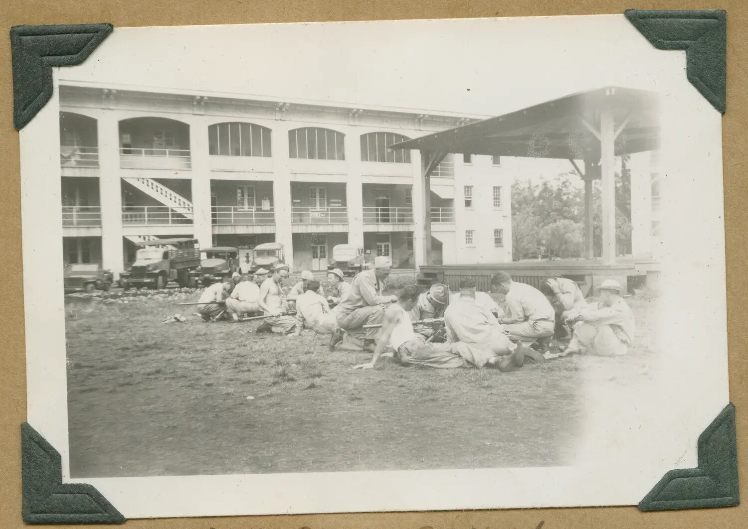 Soldiers Cleaning Weapons Outside Barracks, Schofield Barracks, Oahu, Hawaii, c. 1941–1943