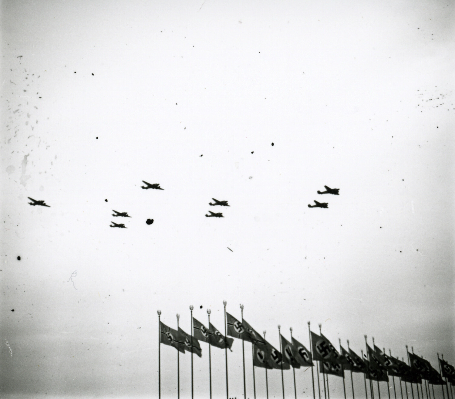 Luftwaffe Aircraft Formation Over Nazi Party Flags, Nuremberg (WWII-era negative collection)