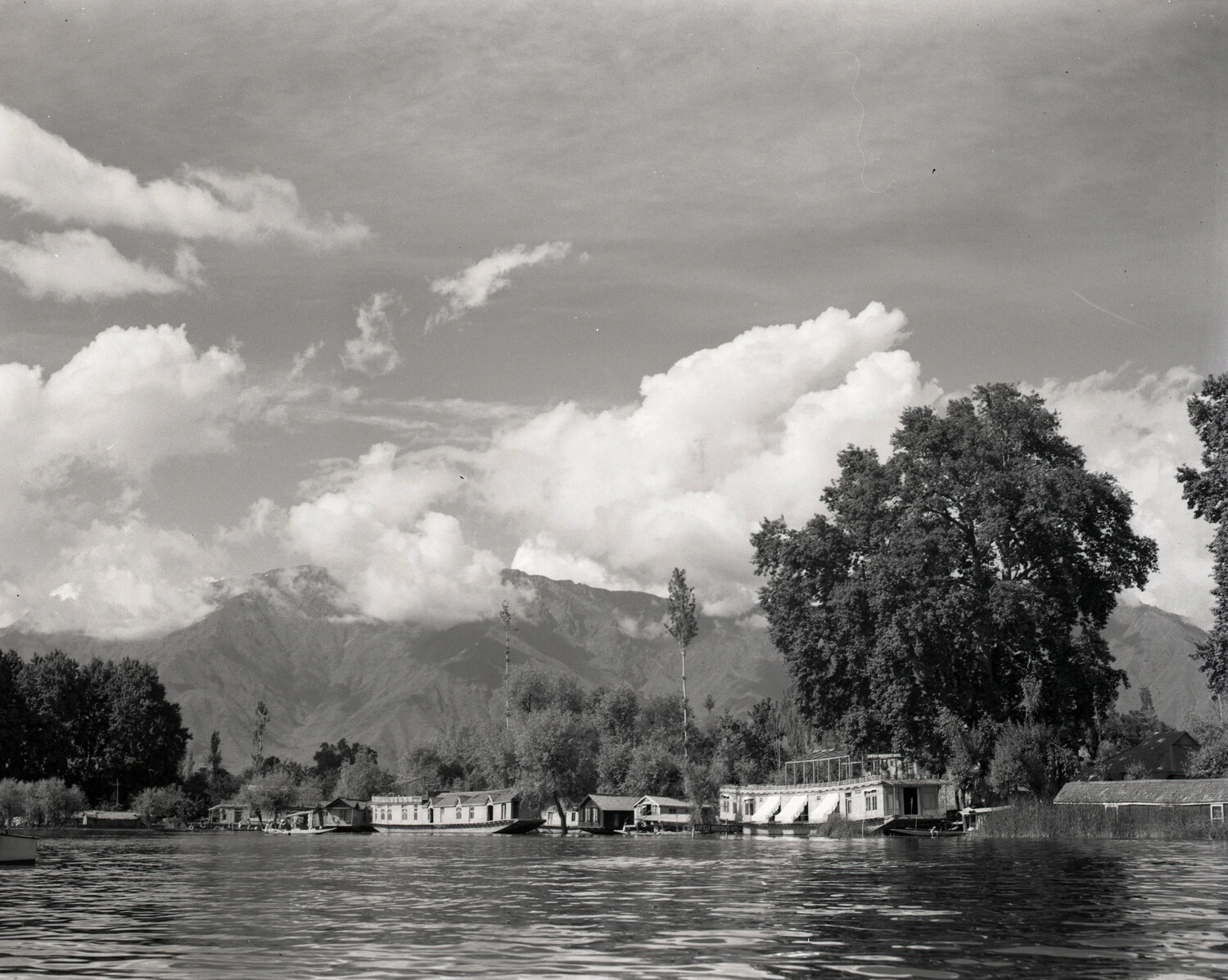 Kashmiri Houseboats on Lakeshore with Himalayan Backdrop, 'Scenics-Kashmir' Series