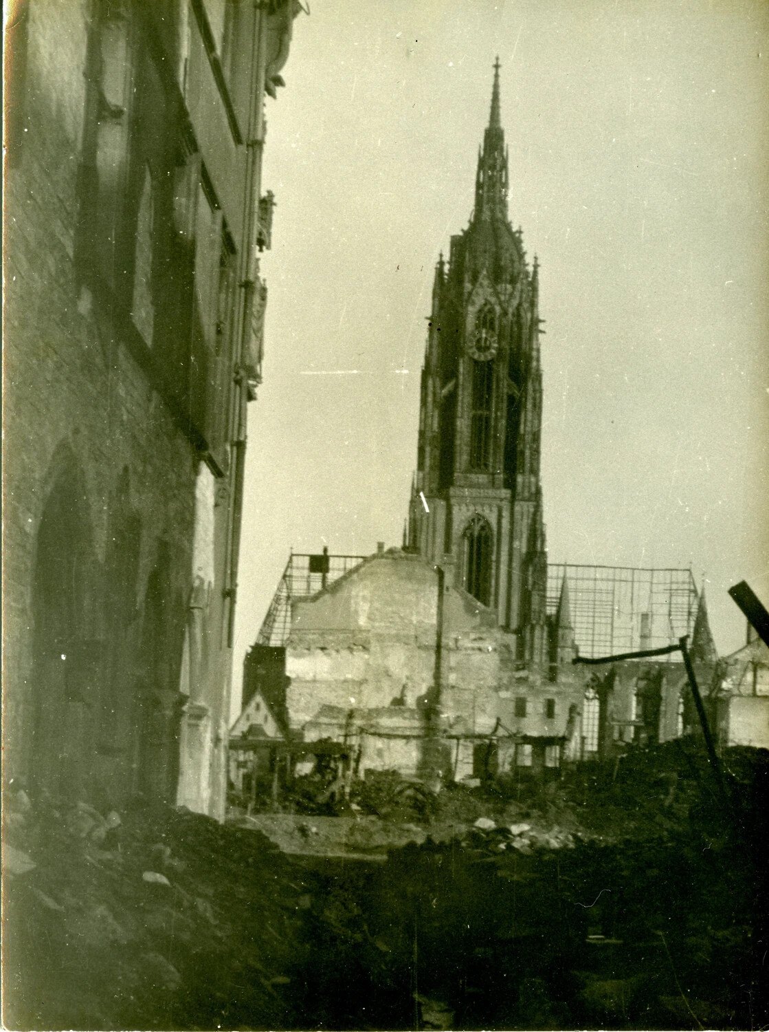 Surviving Gothic Cathedral Spire Amid War-Ruined German City, 11th Armored Division Collection, 1945