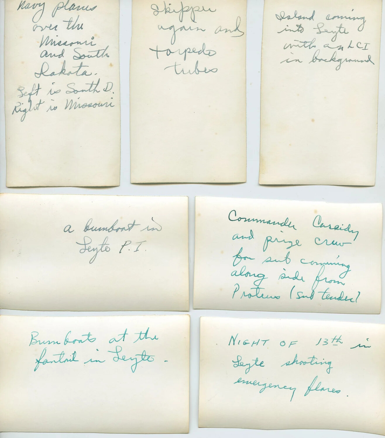 Handwritten Album Caption Page: Battleships, Bumboats, and a Submarine Prize Crew — Leyte Collection