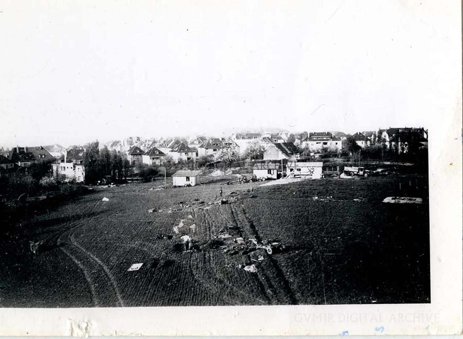 Aircraft/Glider Crash Wreckage Site in a Field Near a German Town, WWII European Theater