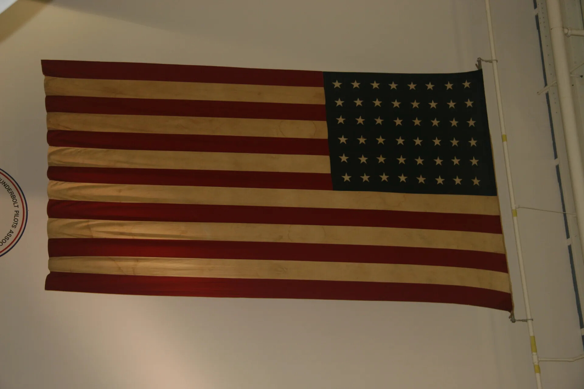 Vintage 48-Star American Flag on Display, Thunderbolt Pilots Association Venue