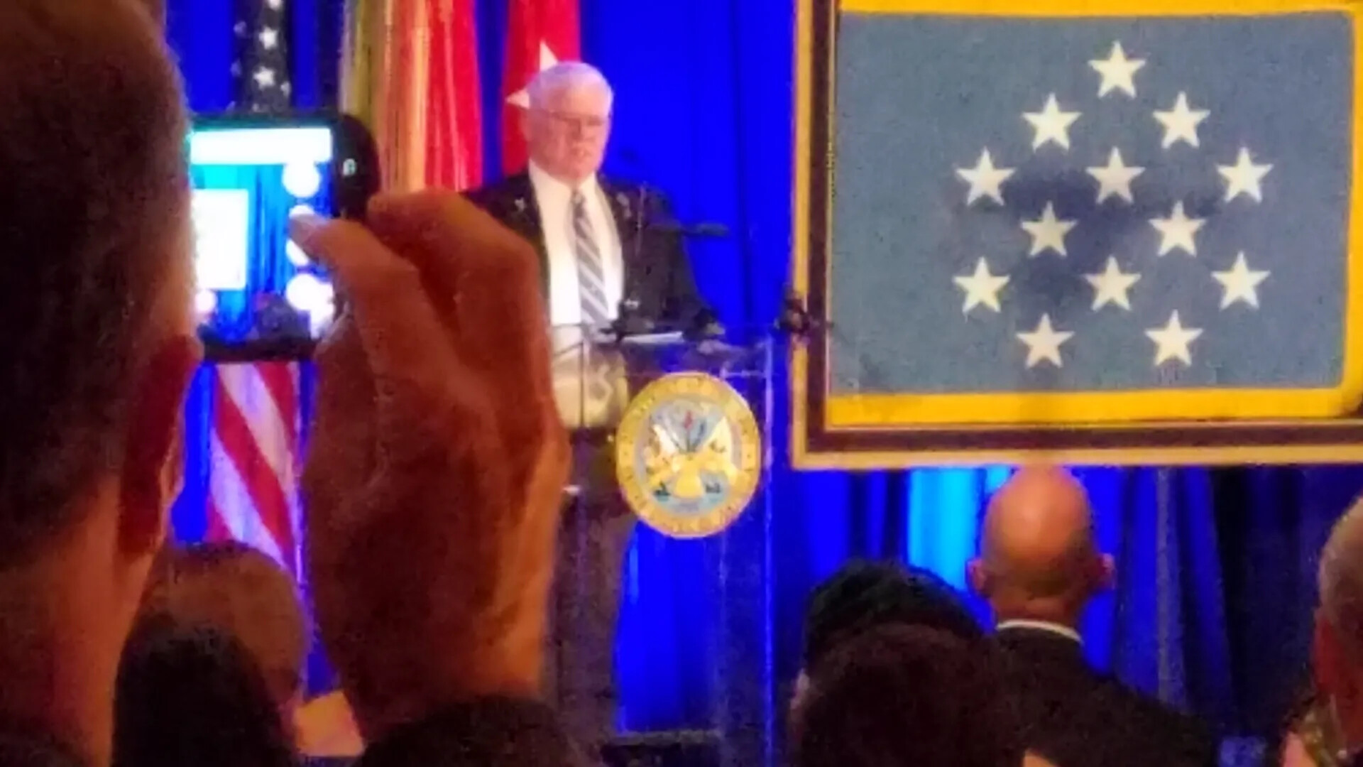 Speaker at Podium with Medal of Honor Flag Display, Gary 'Mike' Rose MOH Ceremony Events, October 2017