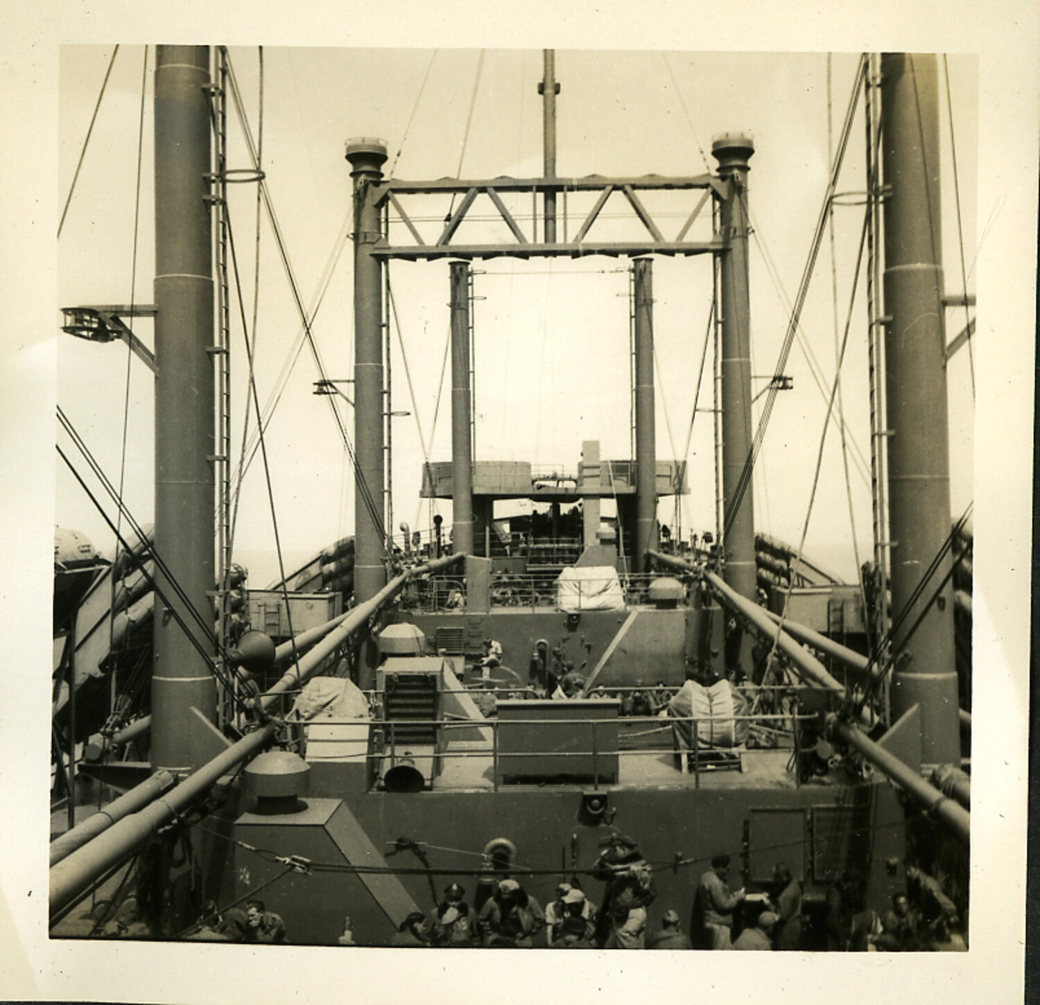Deck View Aboard Military Transport Ship with Cargo Booms and Servicemen, WWII/Postwar Era