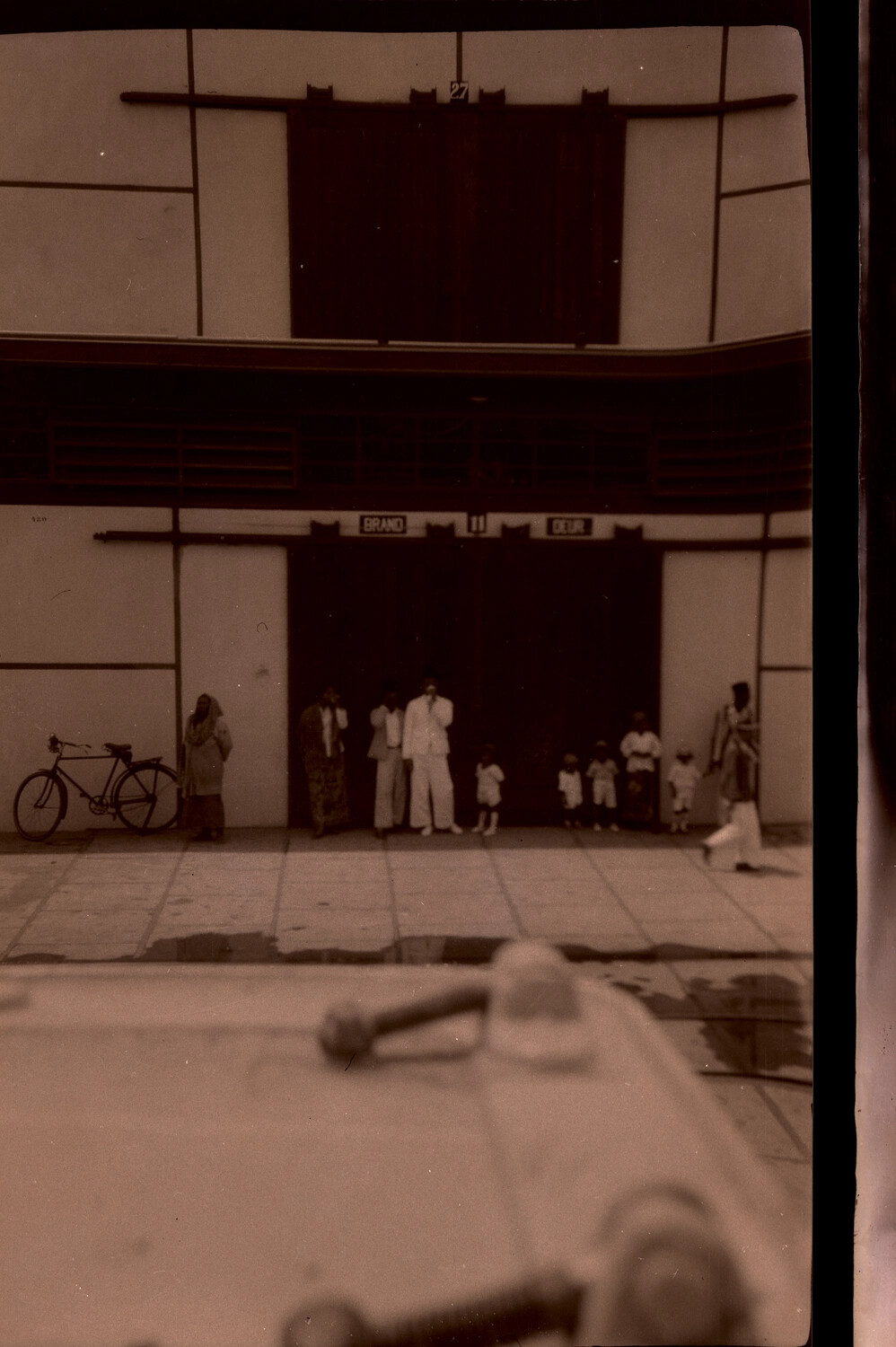 Street Scene at a Dutch Colonial Building, Netherlands East Indies Port Call (US Navy China Station Album, 1930s)