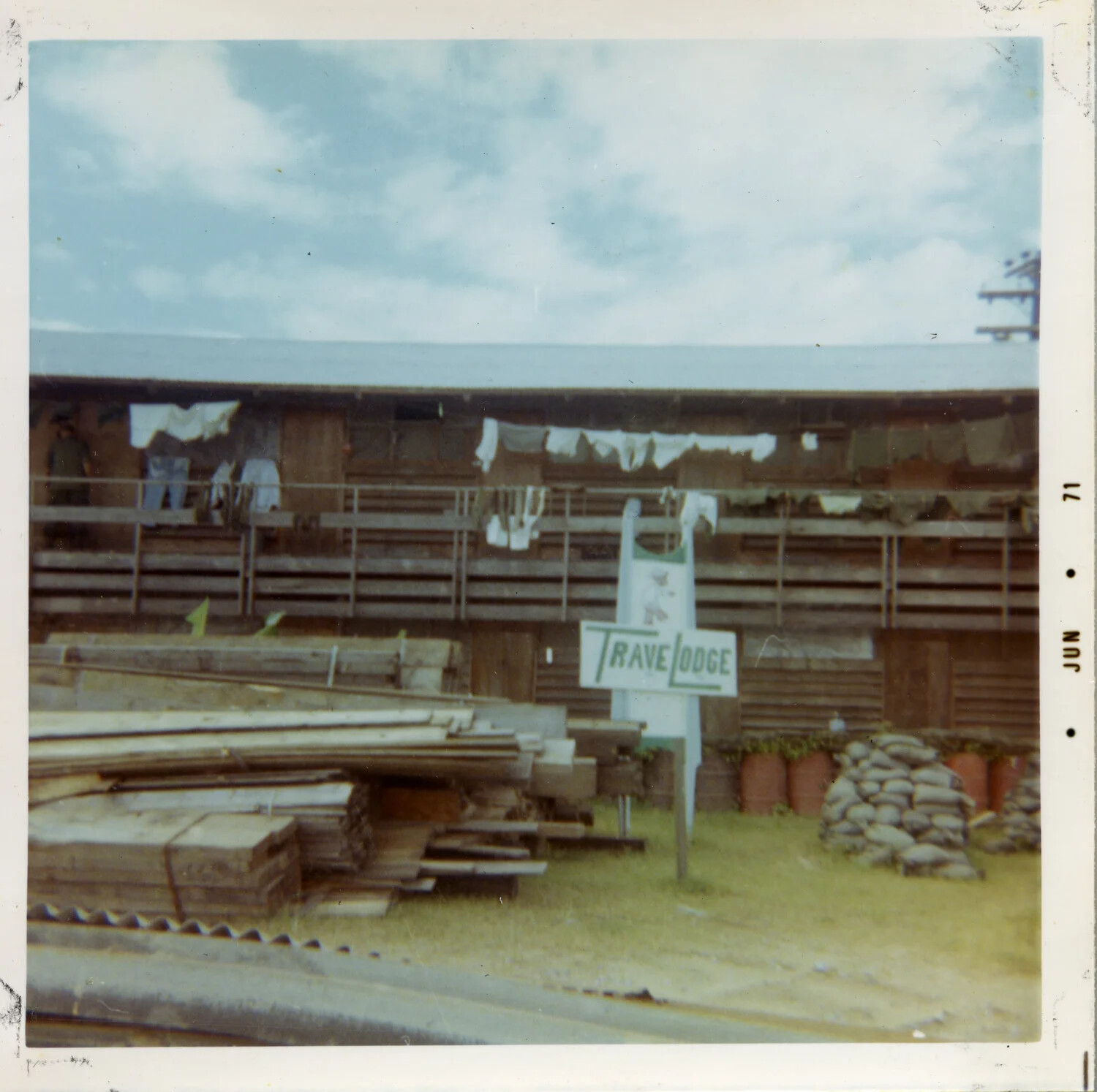 Hand-Painted Mock 'TraveLodge' Sign at Troop Billet, Vietnam, 1971