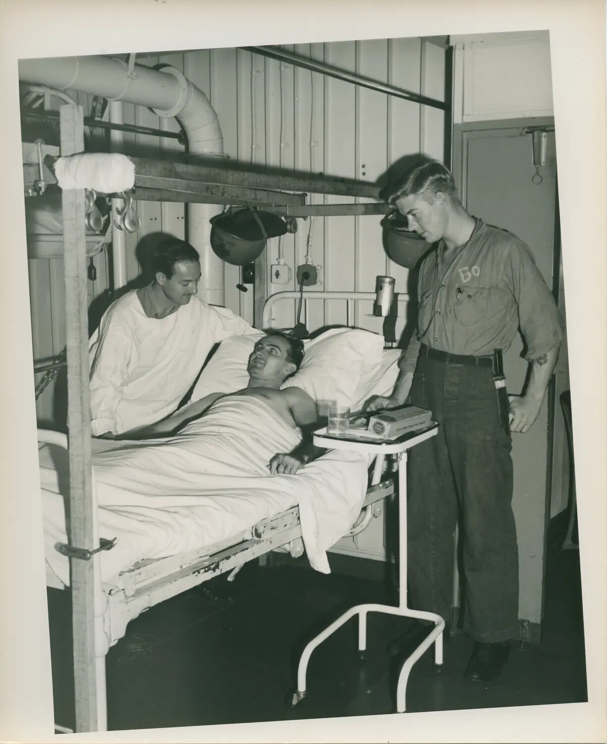 Sailor Recovering in Sick Bay Aboard USS Petrof Bay (CVE-80), World War II