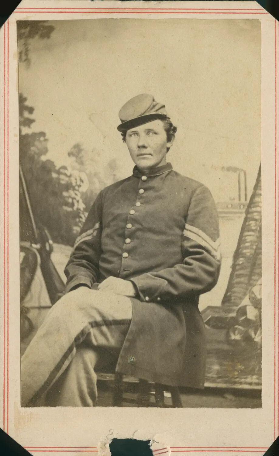 Carte de Visite of Seated Union Sergeant with Rifle and Painted Backdrop, Civil War Era