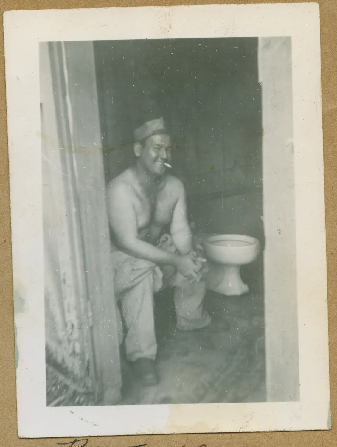 GI Relaxing in Barracks Washroom, Hawaii, WWII-Era