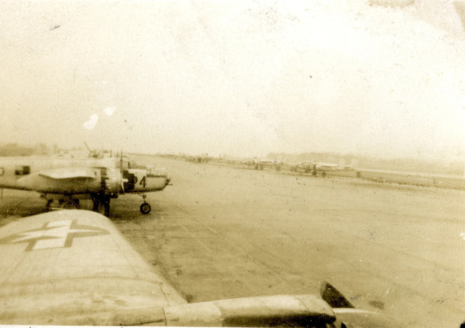 Japanese 'Betty' Bombers with Green Cross Truce Markings on the Runway at Ie Shima, August 1945