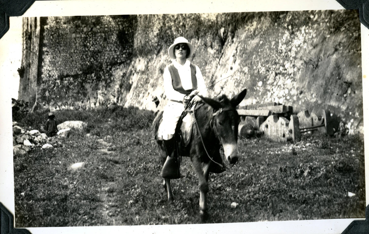 Woman on Muleback Before a Stone Wall, Jervey Family Personal Travel Photograph