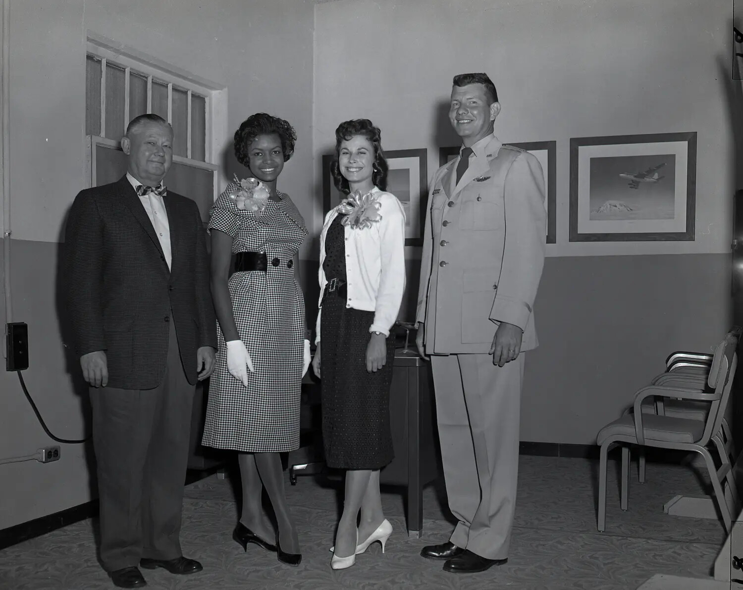 Formal Group Portrait with Air National Guard Officer and Civic Guests, Office Setting