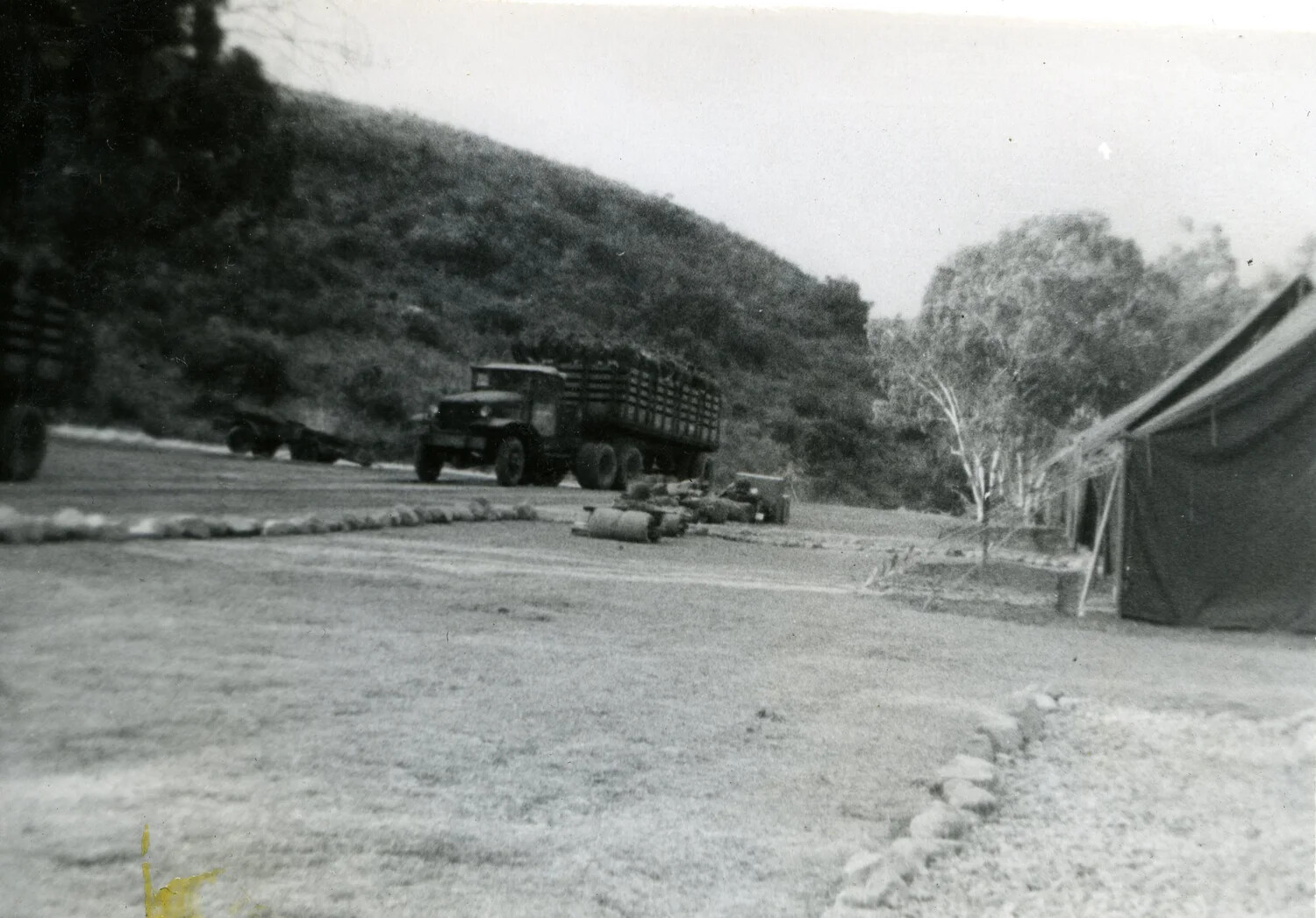 Marine Corps Supply Truck and Encampment, VMF-214 Album, Pacific Theater, 1945