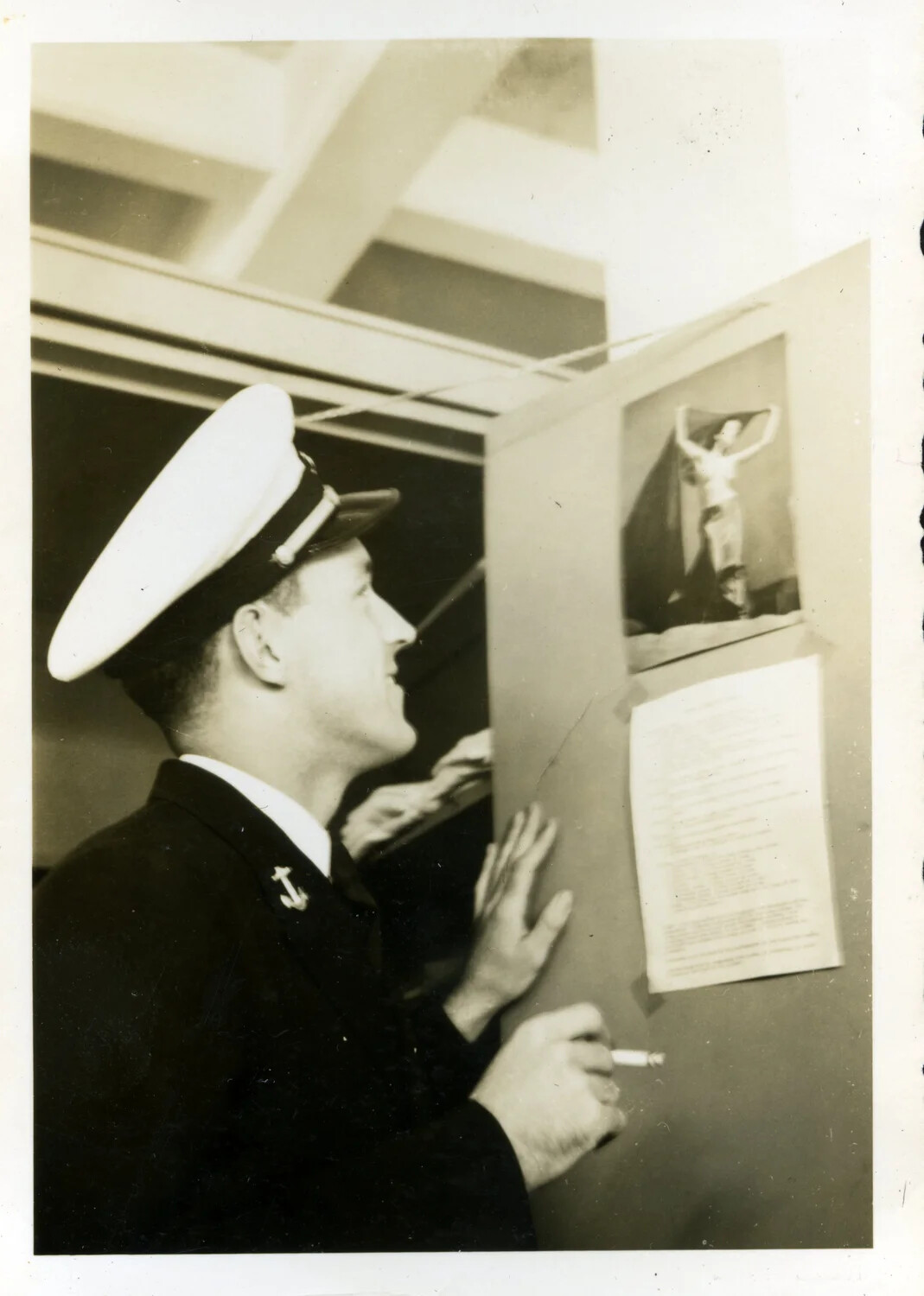 Naval Officer at Barracks Locker with Pin-Up Photo, NAS Pensacola, April 1949