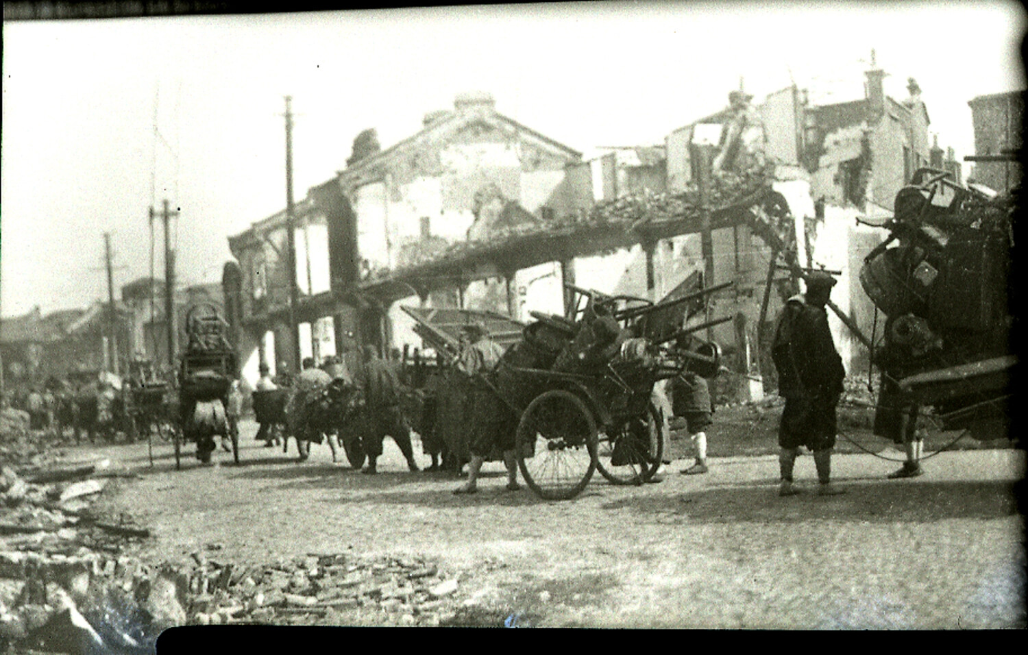 Refugees Fleeing Bomb-Damaged Street, Shanghai, China, 1930s