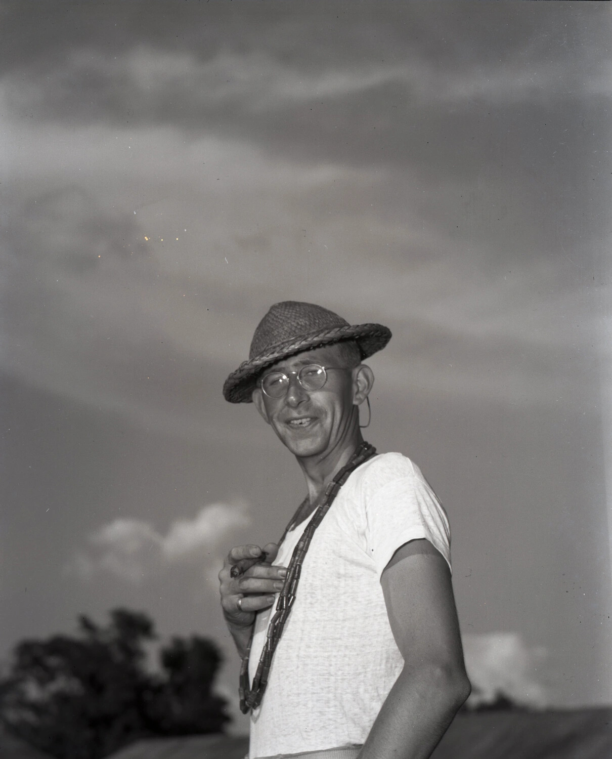 Portrait of Serviceman Wearing Straw Hat and Beaded Necklaces, Kashmir, WWII CBI Theater