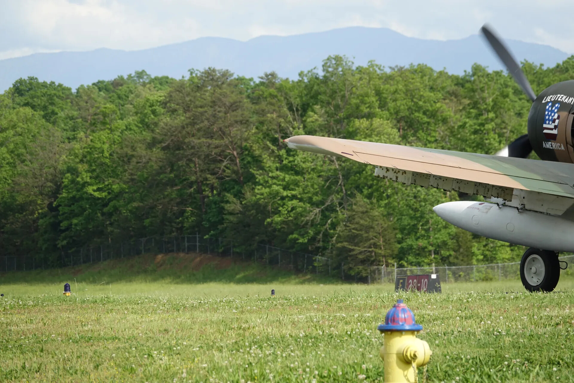 Camouflaged Vintage Warbird with 'Lieutenant America' Nose Art, Tarmac Detail, Air Show, May 2019