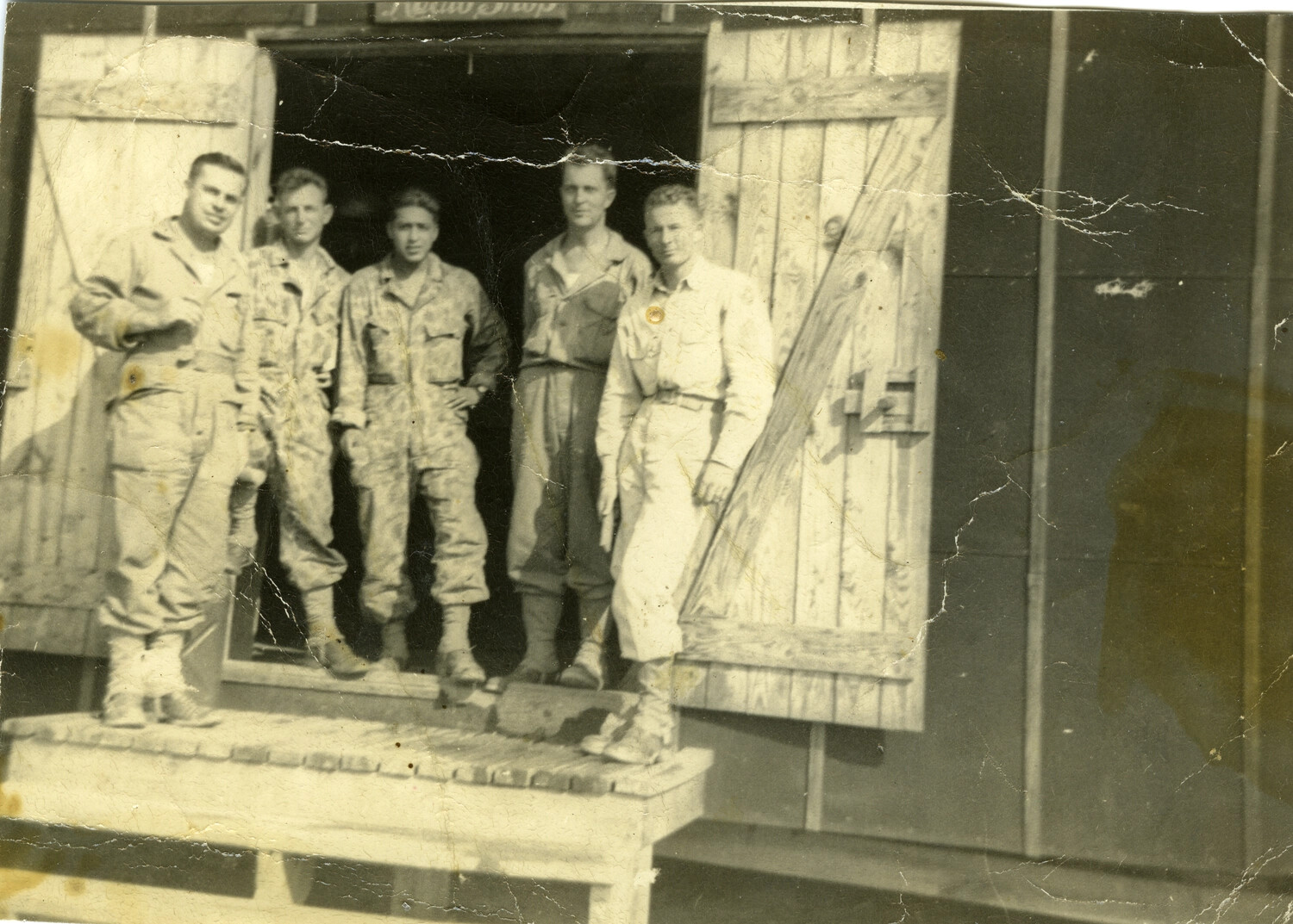 Servicemen at 'Radio Shop' Building, European Theater, WWII